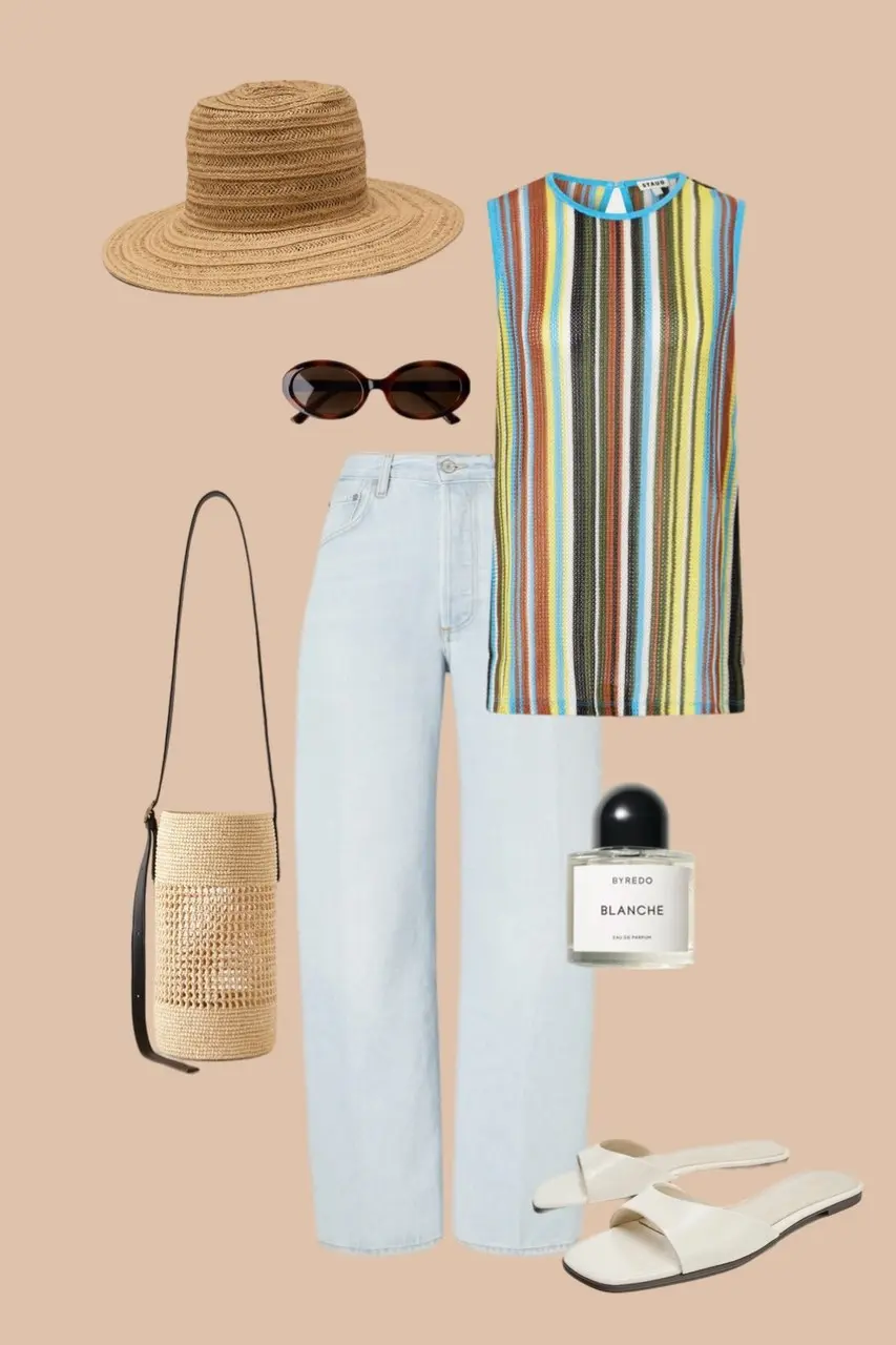 Light wash wide leg jeans with multicolored striped sleeveless top straw wide brim hat oval sunglasses woven bucket bag white slide sandals striped summer outfit 11