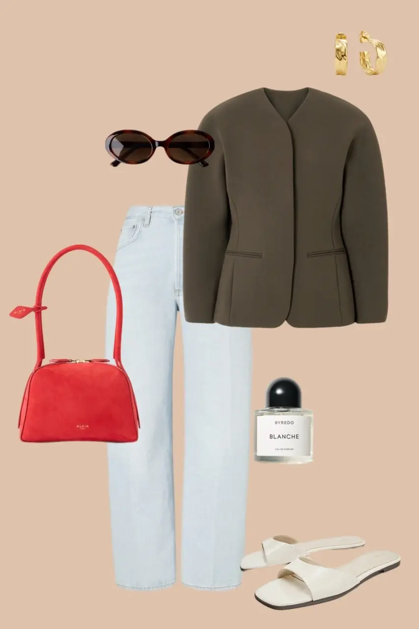 Light wash wide leg jeans with olive collarless structured jacket oval sunglasses red structured bag gold hoop earrings white slide sandals minimalist outfit 16