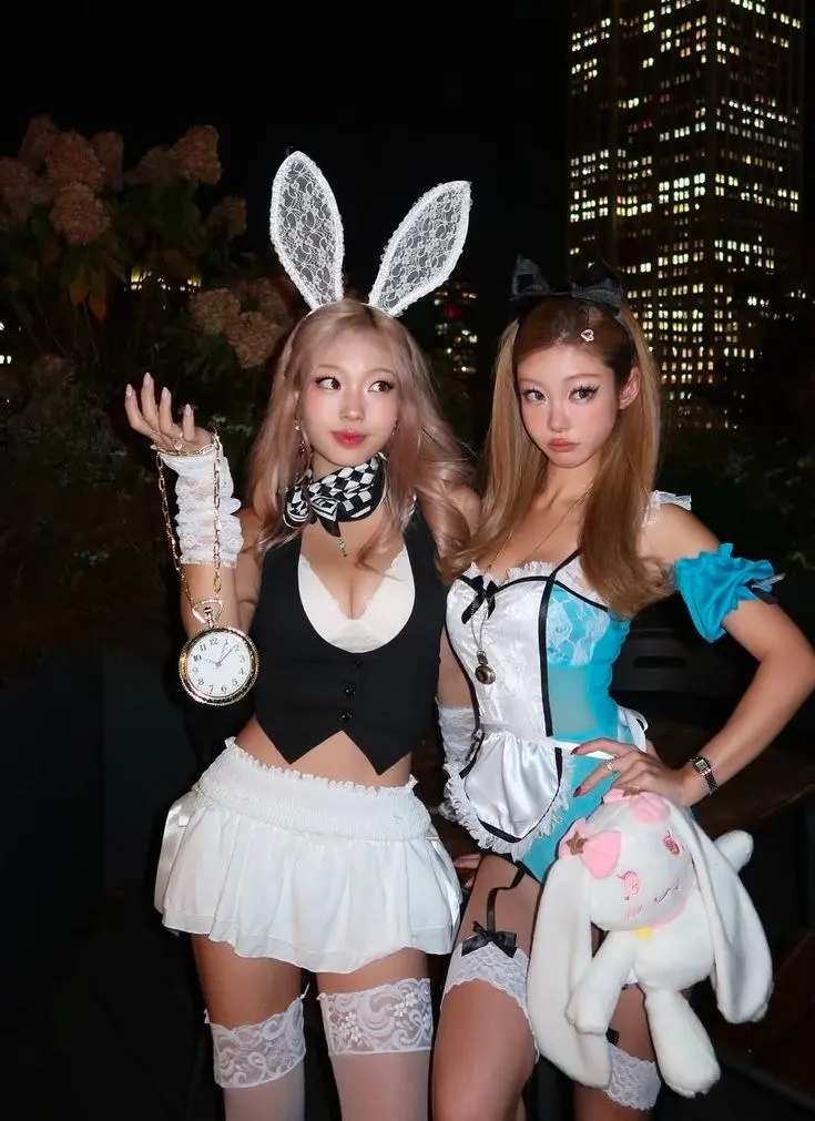 two women alice in wonderland costumes blue dress white bunny outfit lace stockings outfit 7