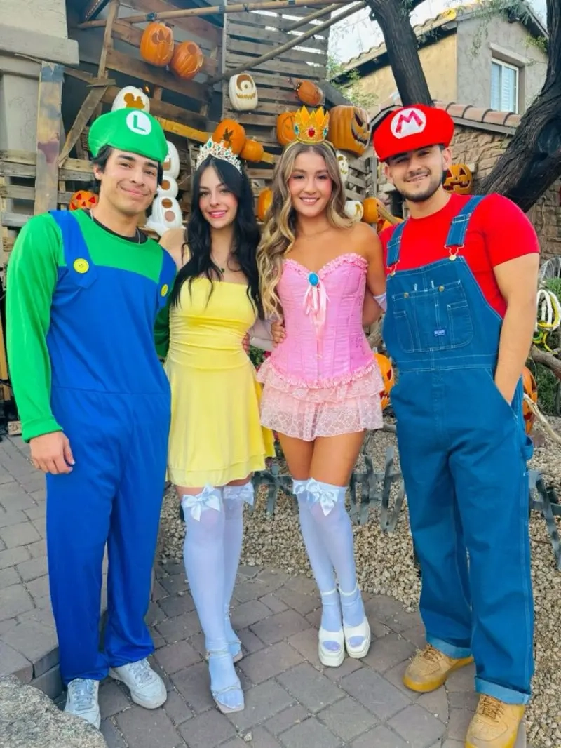 four women in south park character costumes with colored winter hats and basic clothing outfit 17