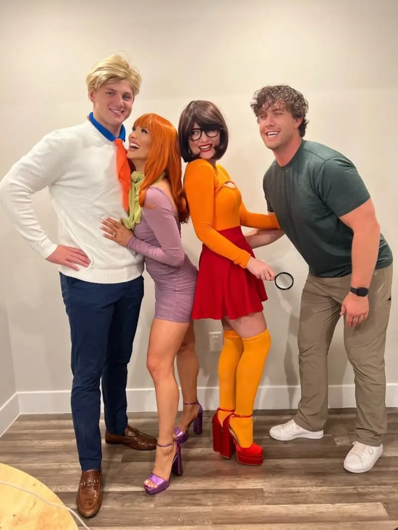 four people dressed as scooby doo characters fred daphne velma and shaggy with signature outfits outfit 16