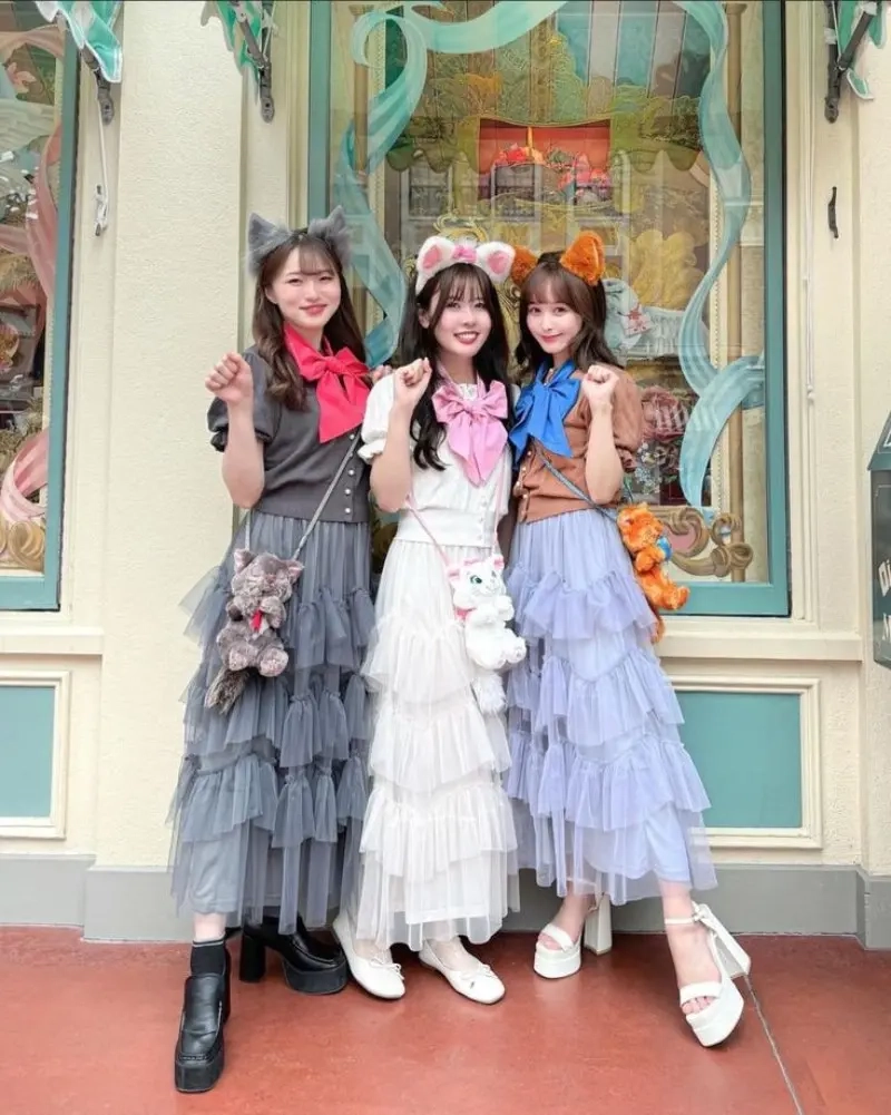 three women in animal ears costumes tulle skirts cat mouse ears 5