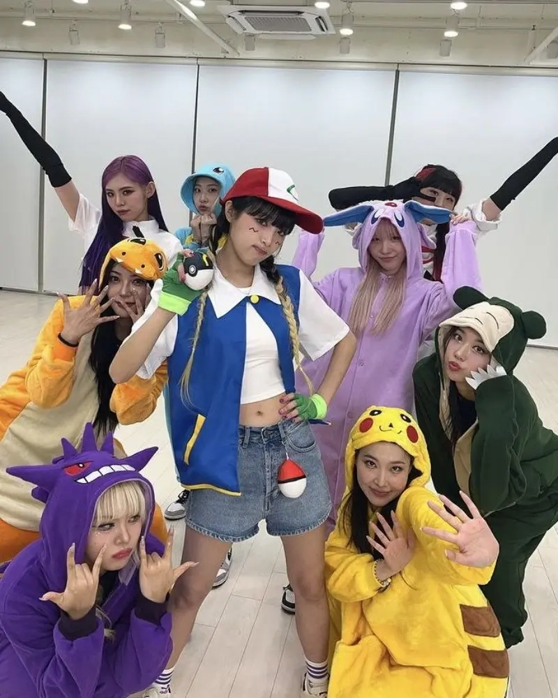group of people in pokemon costumes ash trainer gengar pikachu onesies 4