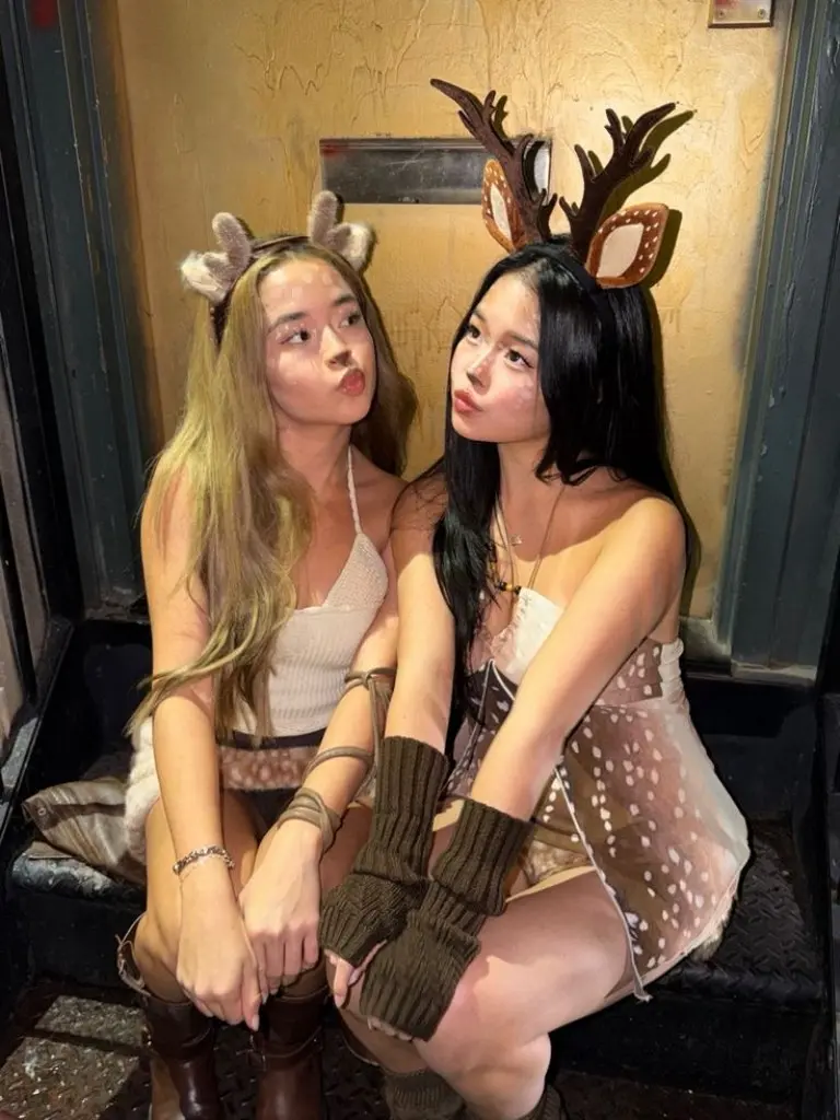 two women as woodland deer with antler headbands and neutral outfits outfit 10
