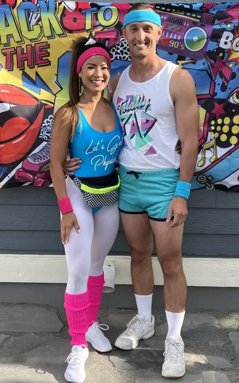 woman blue tank checkerboard shorts man graphic tank turquoise shorts matching headbands costume 5