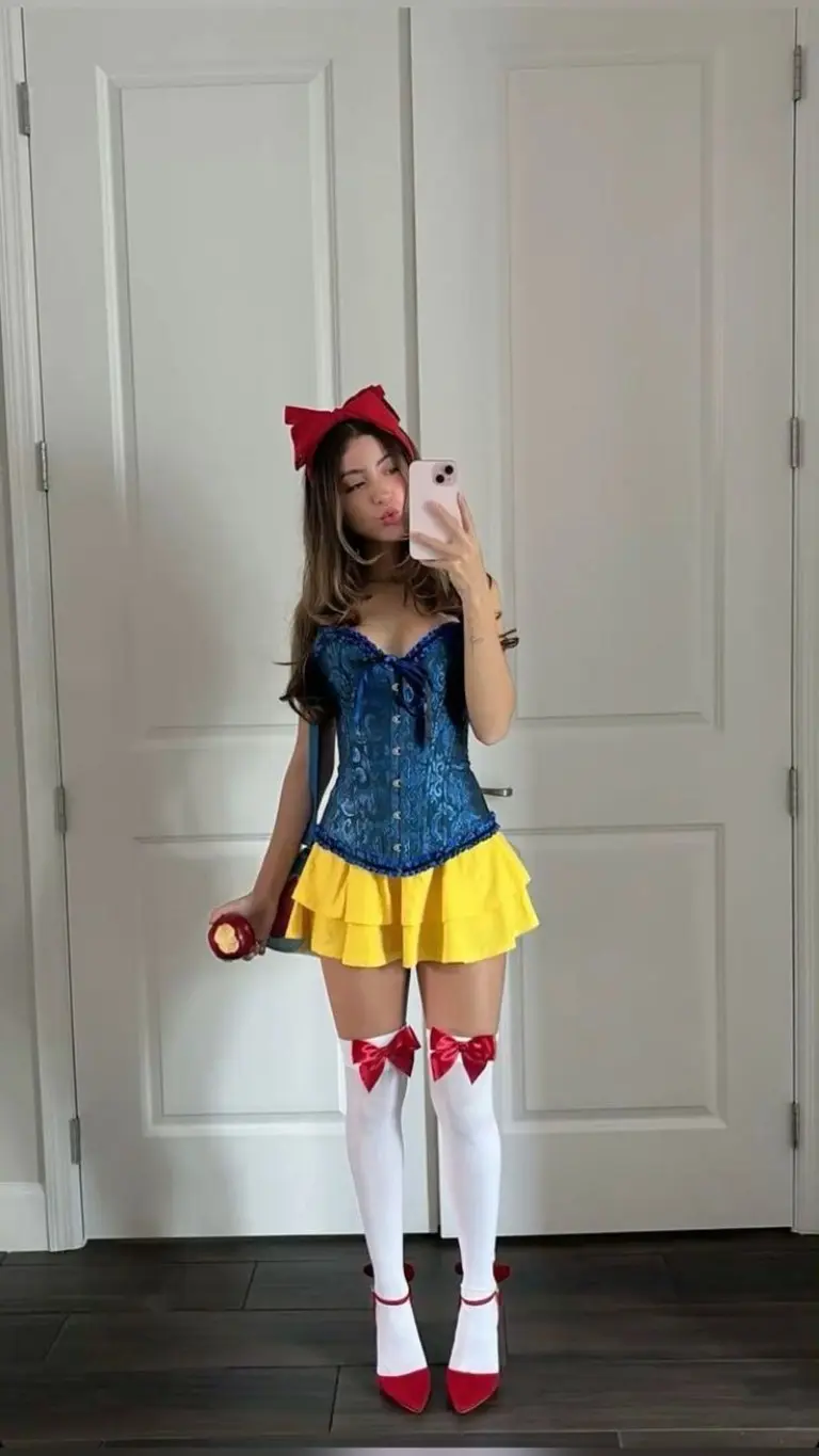 woman in blue corset yellow skirt with red bow and white knee-high socks outfit 8