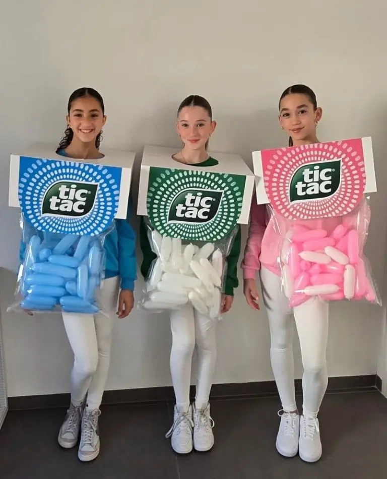 three teenage girls wearing tic tac package costumes blue green pink colors coordinated group outfit 15