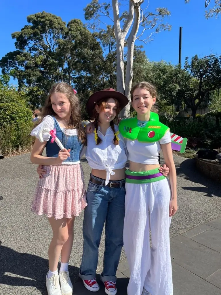 three teenage girls wearing toy story character costumes bo peep woody buzz lightyear interpretation outfit 4