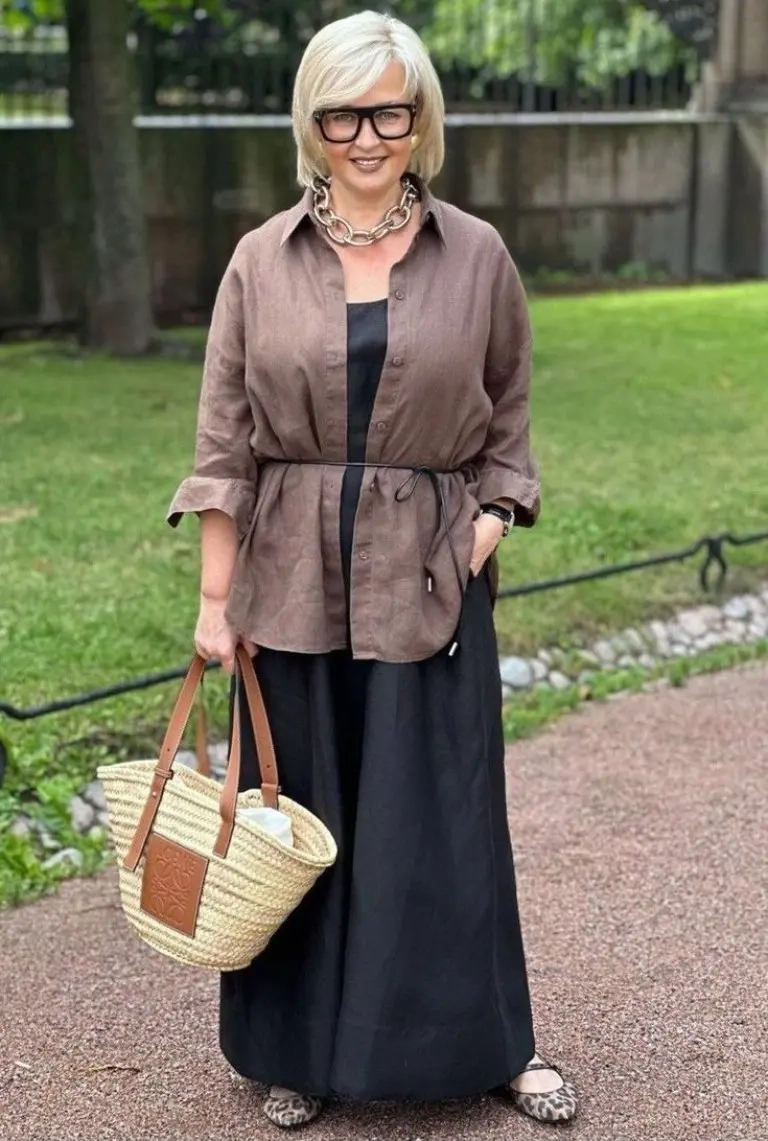 woman in brown belted shirt dress chain link necklace woven tote bag leopard print flats 12