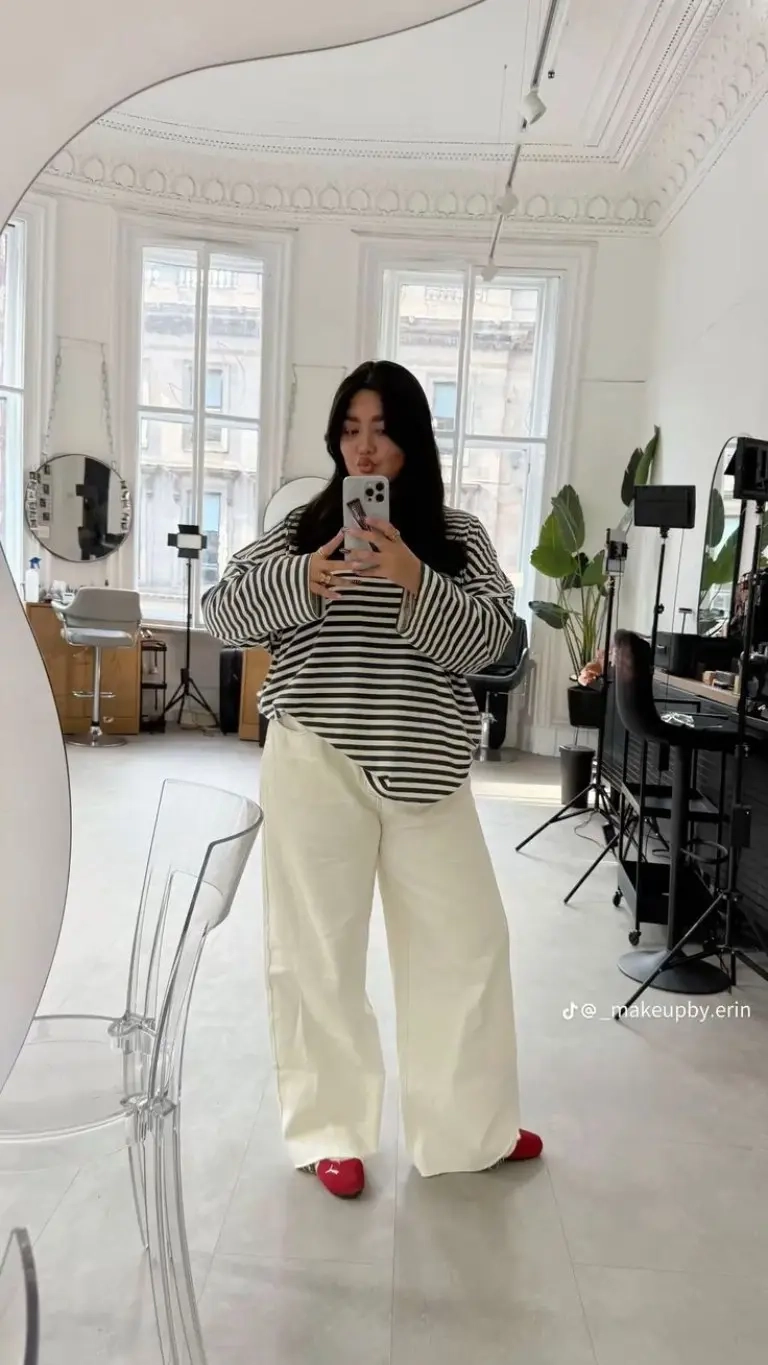 black white striped oversized sweater cream pants red shoes outfit 7
