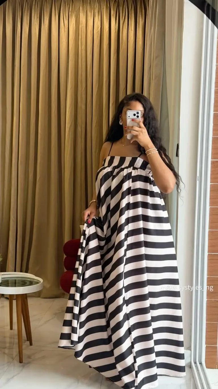 woman in black white striped strapless maxi dress mirror selfie outfit 6