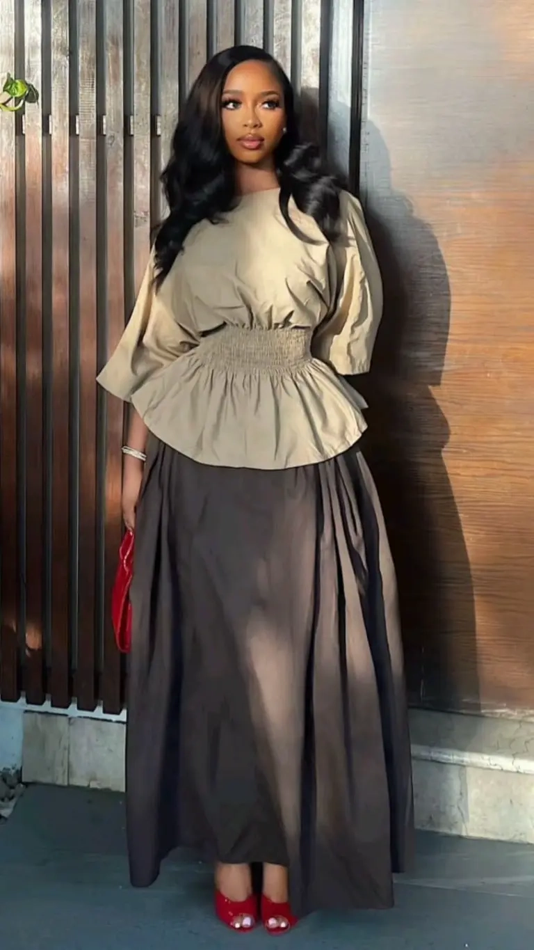woman in beige peplum blouse brown midi skirt red heels red clutch outfit 4