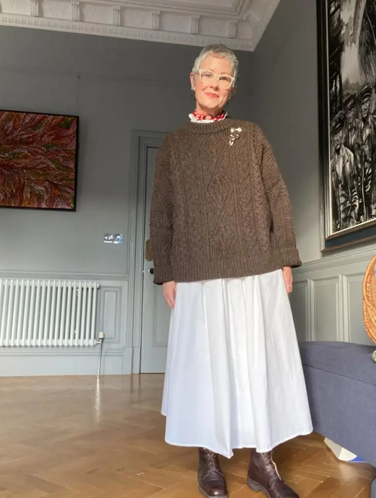 brown cable knit sweater white full skirt brown oxford shoes red collar detail outfit 1