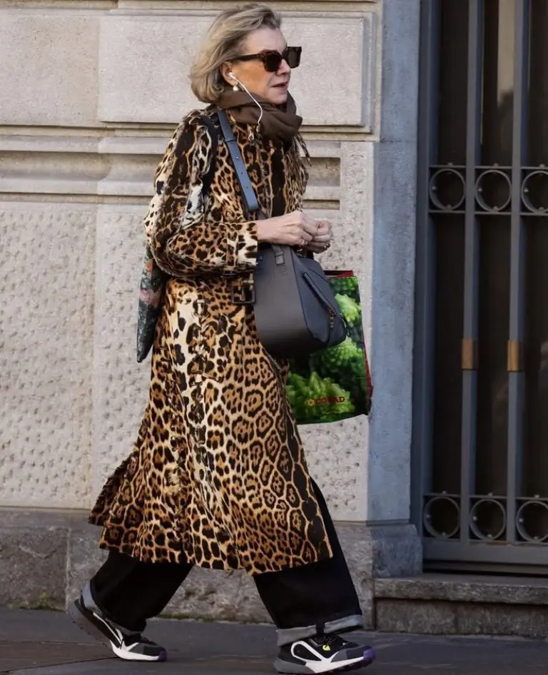 leopard print long coat brown scarf black pants black sneakers black crossbody bag sunglasses outfit 4