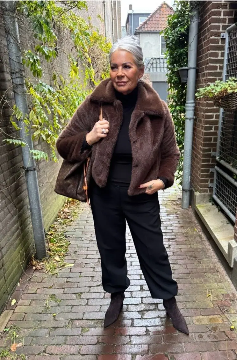 brown fur coat black turtleneck black pants black boots brown handbag outfit 6