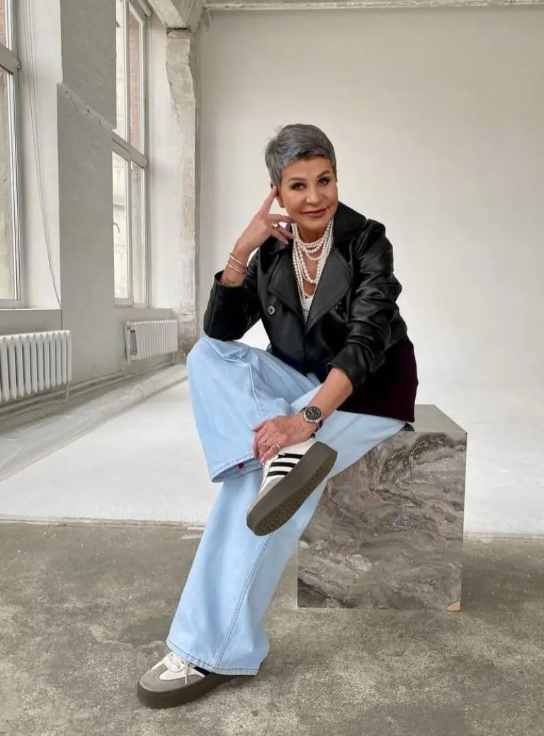 black leather moto jacket pearl necklaces light blue wide-leg jeans green olive sneakers pixie haircut outfit 14