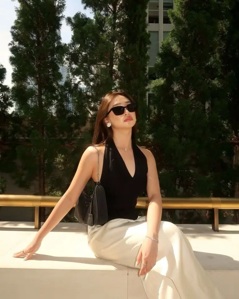 black halter top wide leg beige pants black bag sunglasses outfit 20