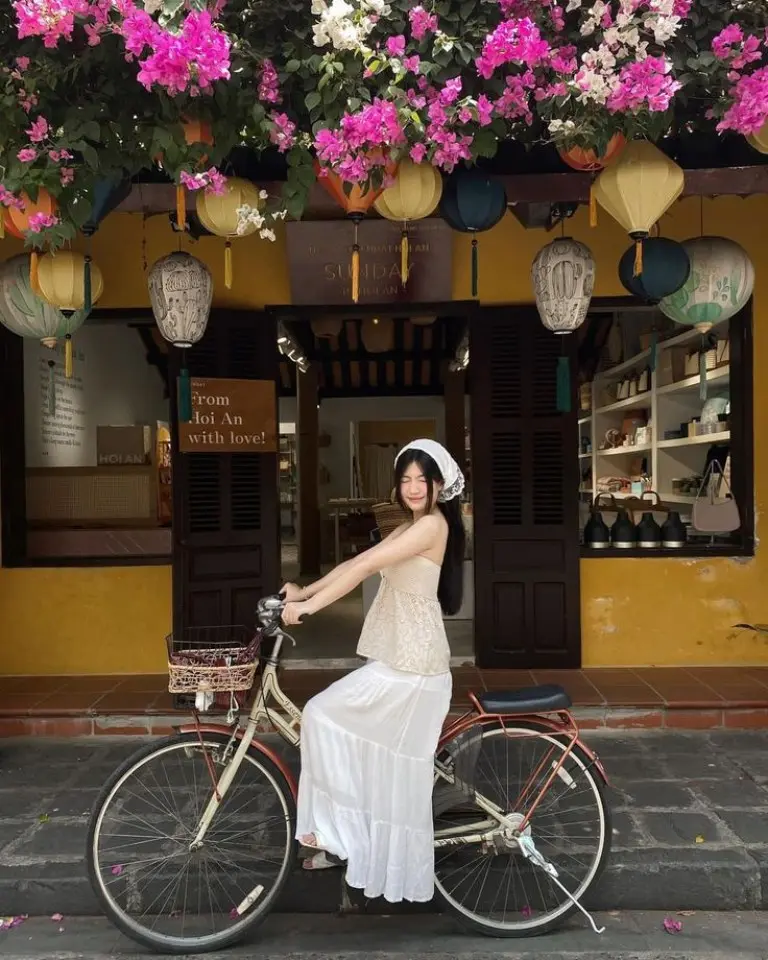 white eyelet midi dress white headscarf bicycle vintage yellow building outfit 5