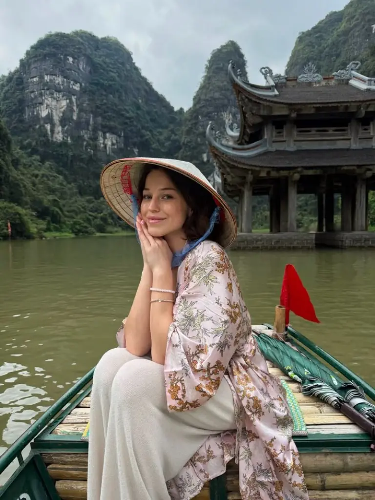 floral kimono style top beige wide leg pants conical hat river cruise boat traditional outfit 16