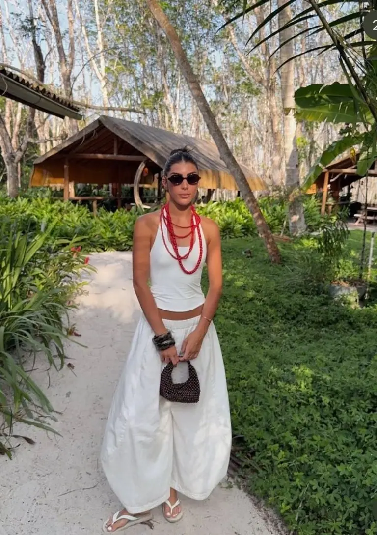 white tank top white maxi skirt red layered beaded necklaces woven clutch beach resort elegant outfit 26