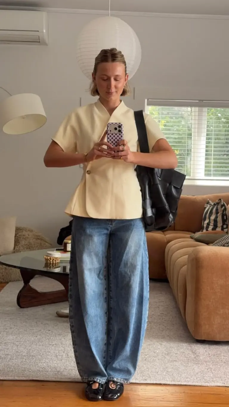 butter yellow linen blazer wide leg blue jeans black patent loafers black tote bag casual outfit 6