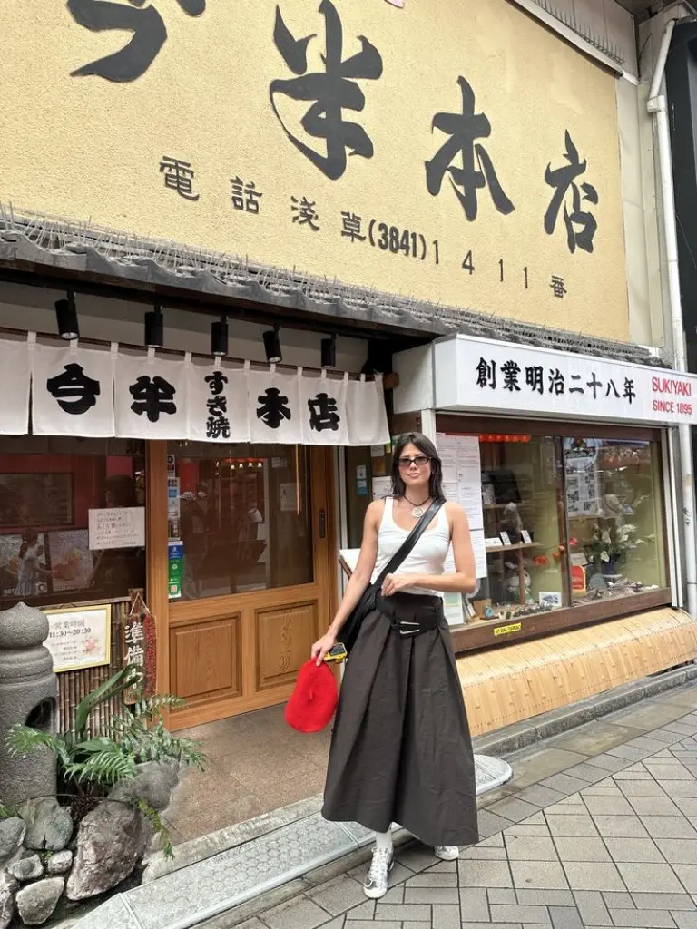 white ribbed tank top black wide leg flowing pants black mary jane flats leather shoulder bag vintage shopping outfit 14