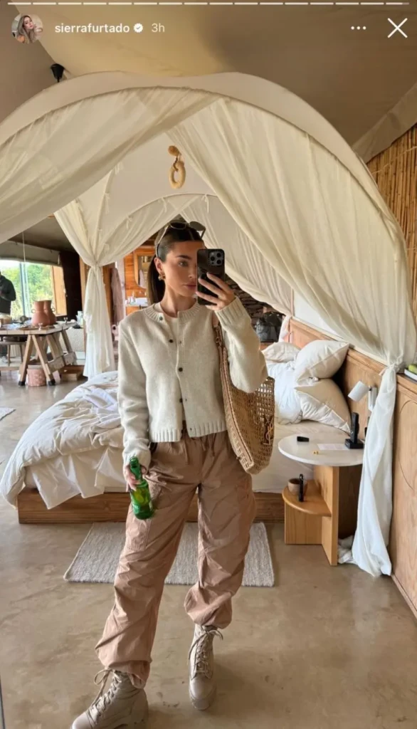 cream cardigan beige cargo pants brown hiking boots woven bag safari lodge outfit 1