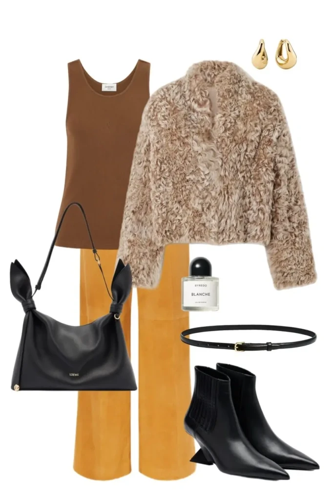 beige curly shearling jacket brown tank top mustard wide leg trousers black pointed ankle boots black bow handle bag gold earrings black belt fur coat outfit aesthetic 1