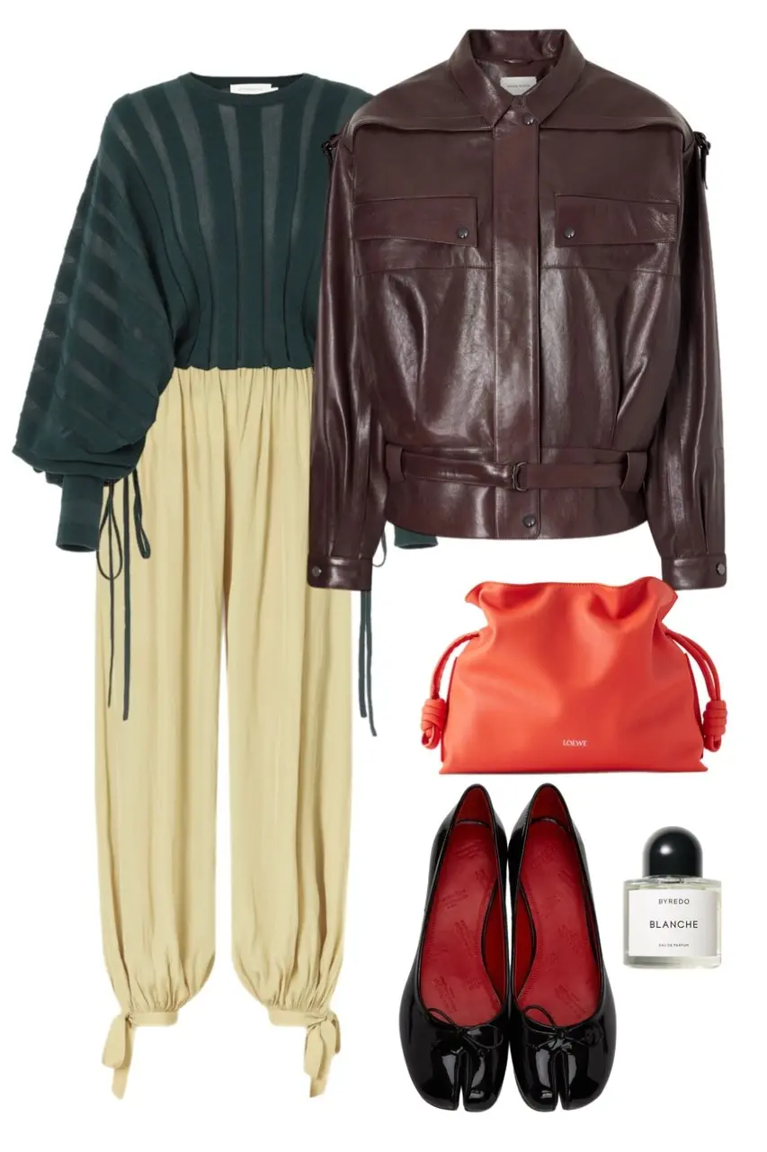 burgundy belted leather jacket dark green sheer knit top cream gathered balloon trousers black patent ballet flats orange red Loewe drawstring bag Byredo perfume outfit 1