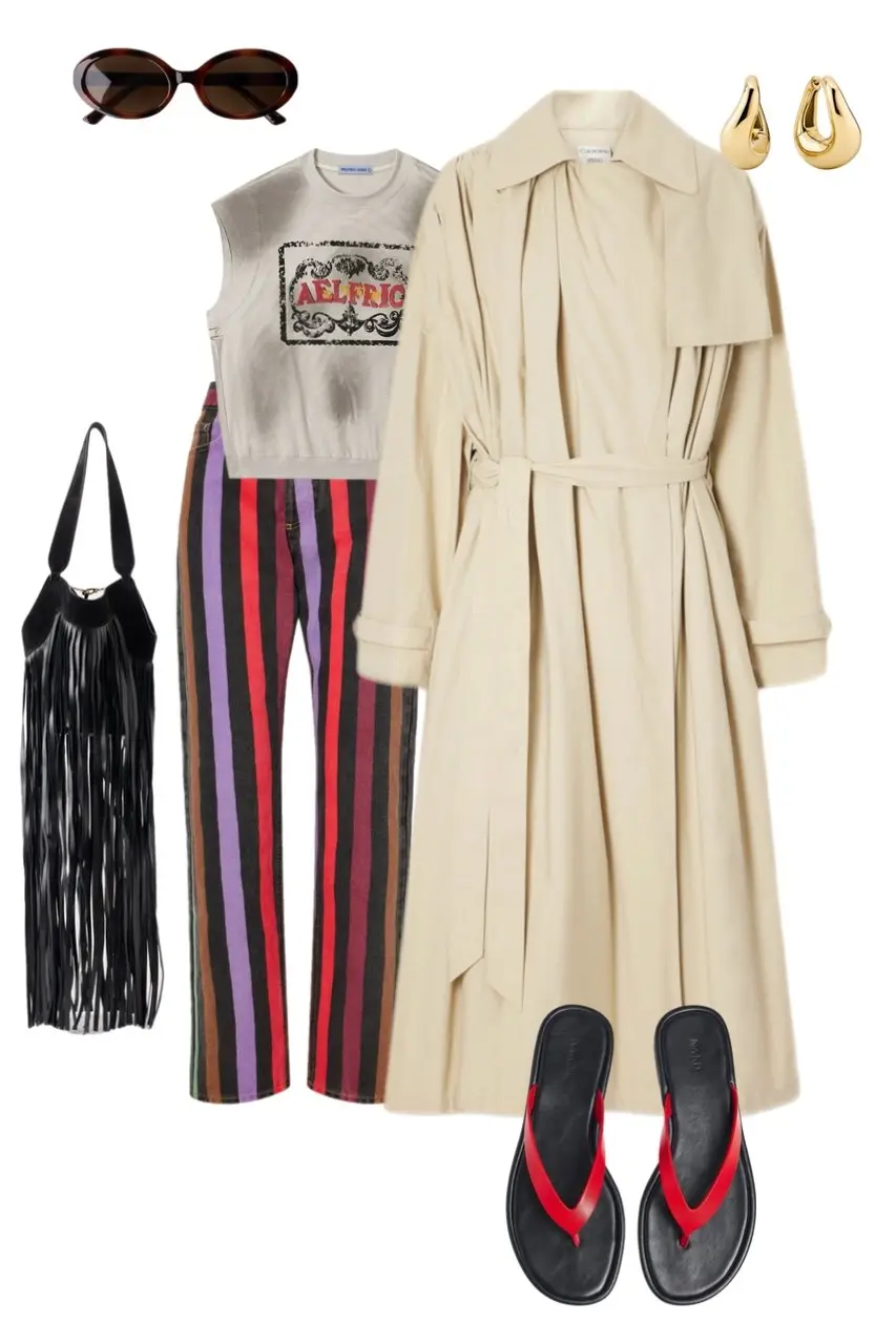 cream draped belted trench coat washed graphic muscle tee multicolor vertical stripe wide leg jeans black fringe shoulder bag black red flip sandals gold teardrop earrings oval sunglasses outfit 4