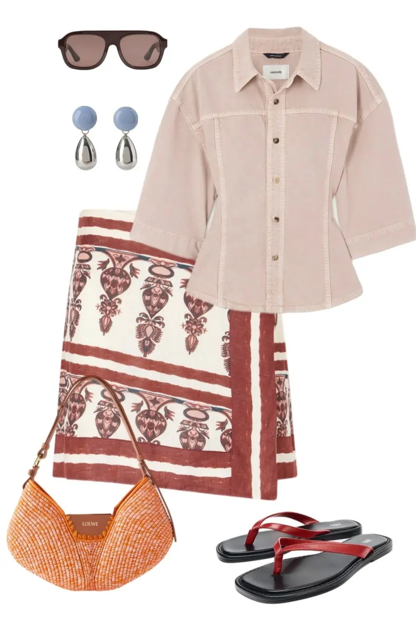 blush pink fitted Haikure denim jacket rust cream navy printed scarf wrap skirt orange raffia Loewe shoulder bag red leather flip flops blue silver drop earrings dark aviator sunglasses outfit 16