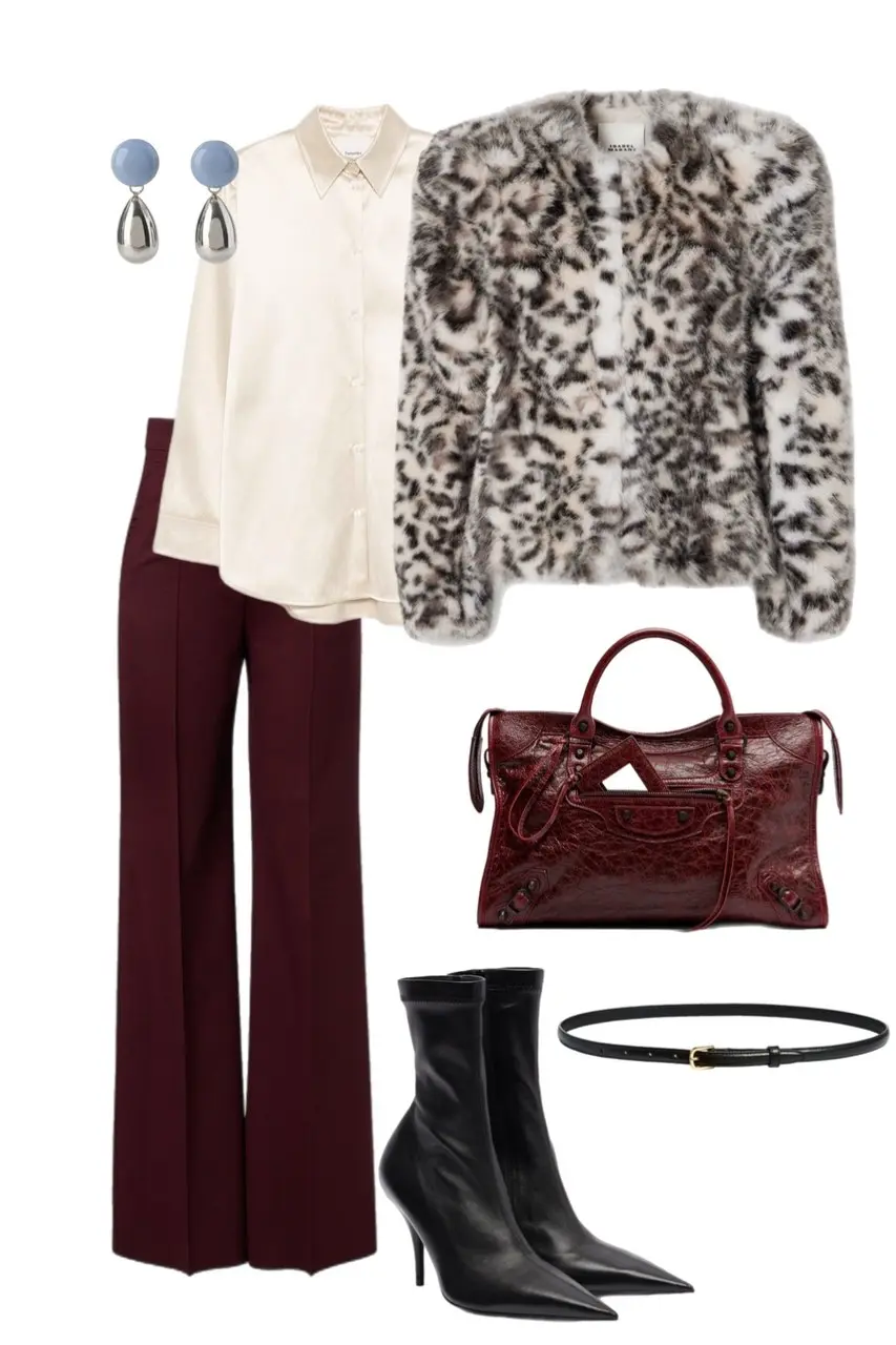 snow leopard faux fur cropped jacket ivory satin button up blouse burgundy wide leg trousers black stiletto sock boots burgundy city bag thin black leather belt blue silver drop earrings outfit 16