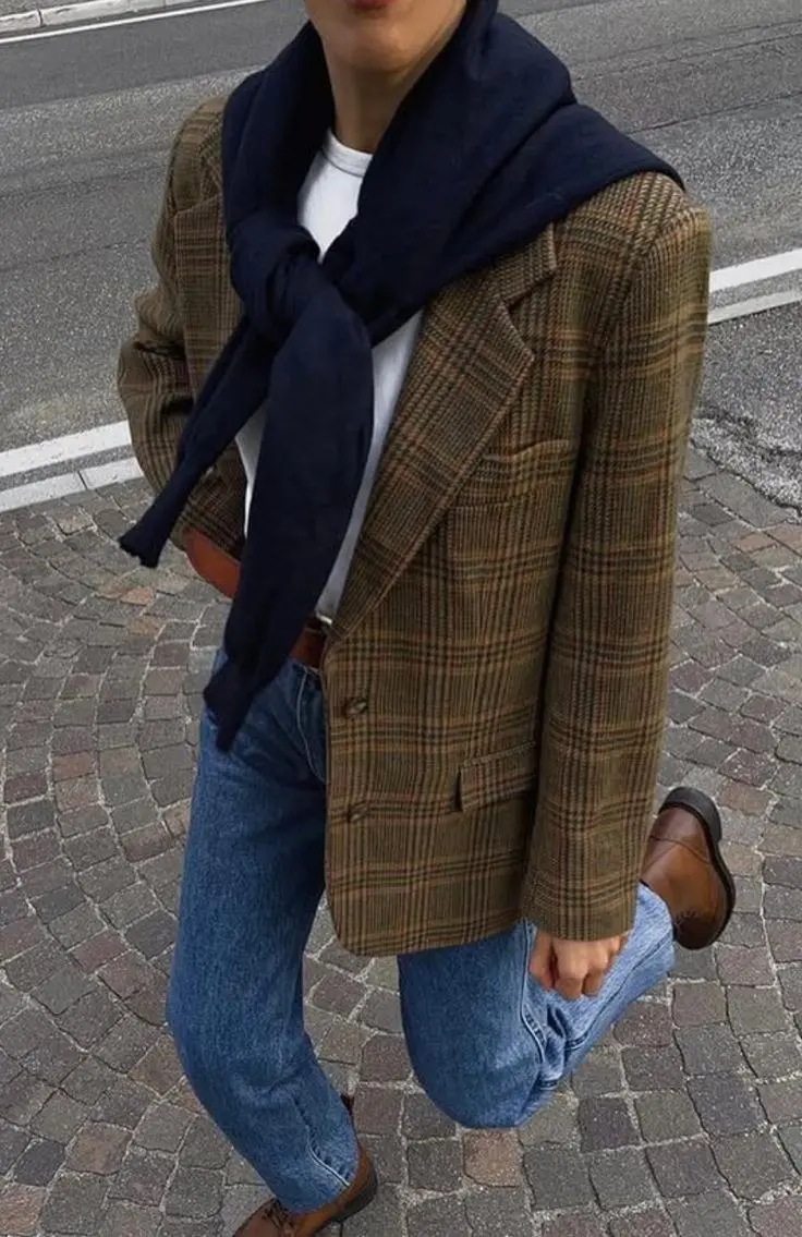 woman in brown heritage plaid blazer white t-shirt navy scarf draped over shoulders straight mid-wash jeans brown leather shoes fall work outfit 3