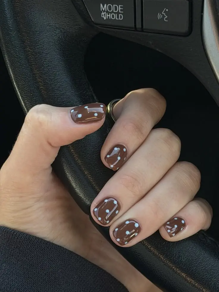short square nails warm chocolate brown gel with white constellation dot and line nail art different pattern on each nail photo 16