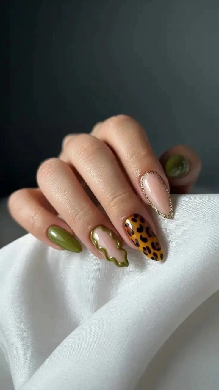almond nails with solid olive green, nude nail with gold glitter French outline, amber leopard print nail, and 3D olive green wave accent nail, photo 6