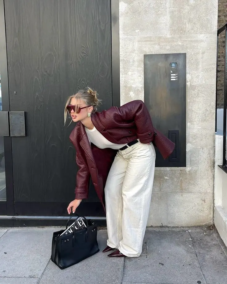 Deep burgundy velvet blazer with matching wide-leg trousers, monochrome moody color dressing, autumn editorial
