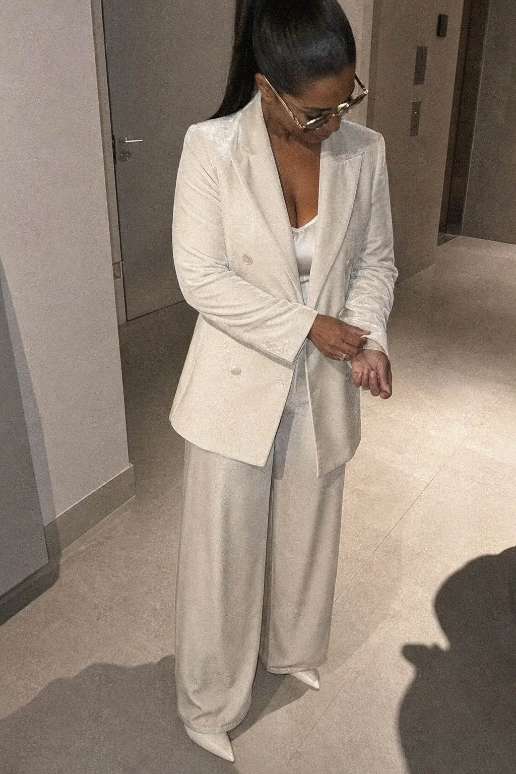 cream velvet blazer matching velvet tailored trousers white bodysuit cream heels white christmas outfit 20