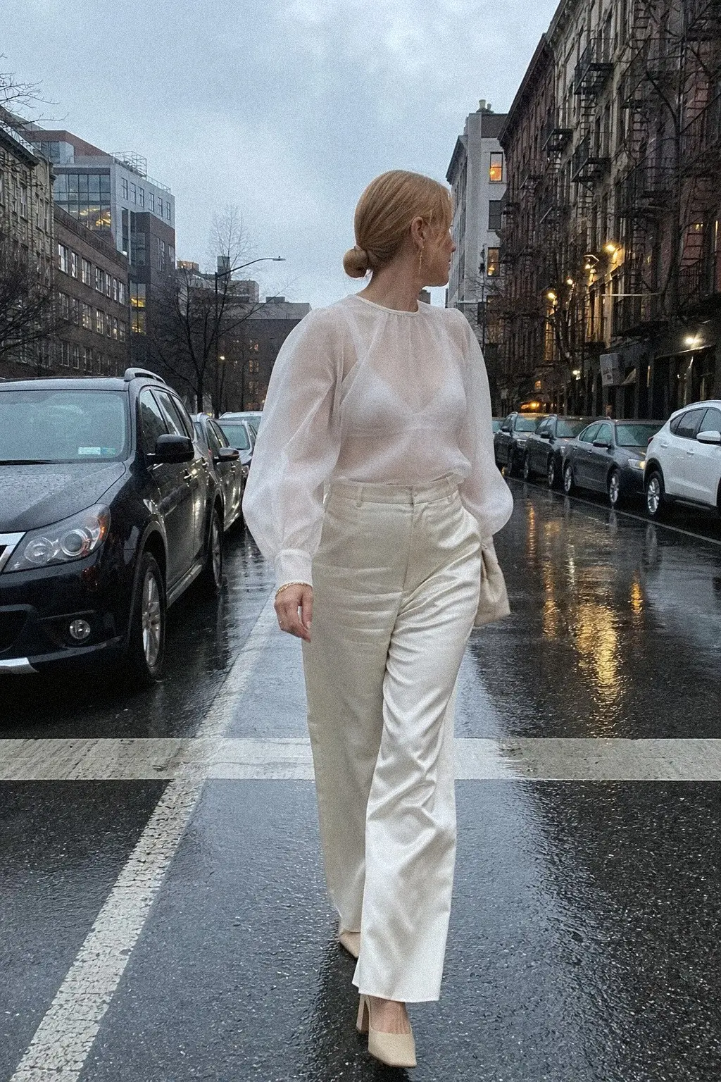 sheer white organza blouse ivory high waist satin trousers white bralette cream square toe heels gold earring white christmas outfit 21
