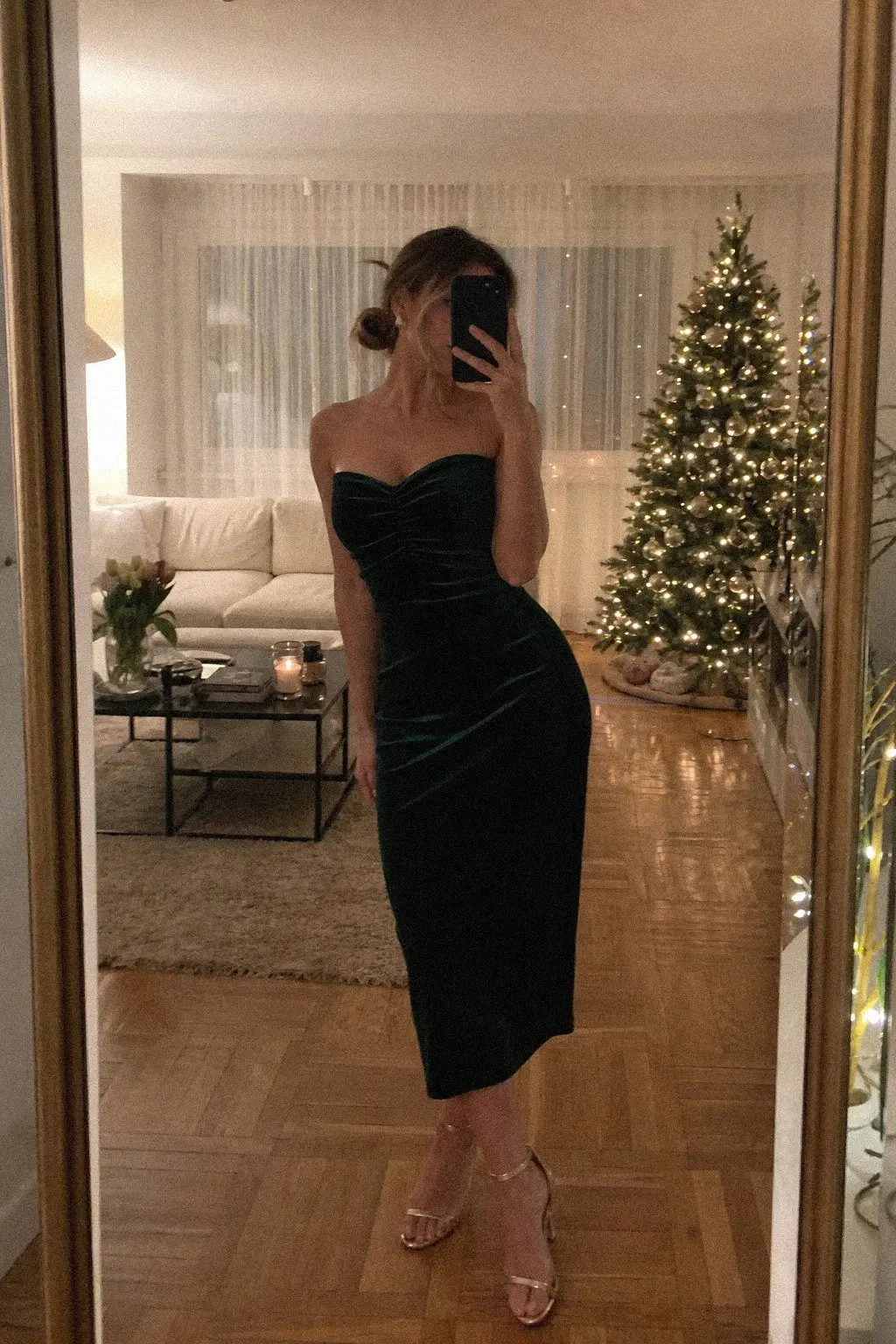 emerald green velvet midi dress with sweetheart neckline and gold strappy heels christmas outfit 1