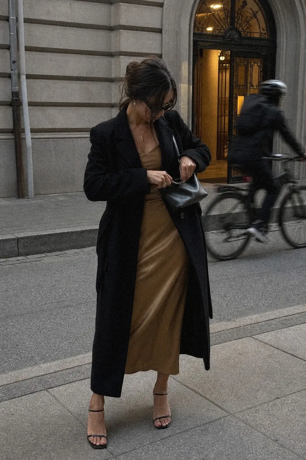 camel velvet slip dress tailored black wool coat gold bar necklace black strappy heels christmas outfit 20