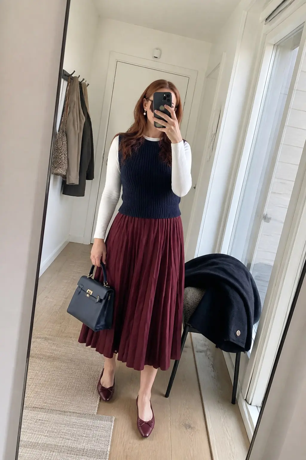 navy ribbed knit vest white long sleeve shirt burgundy pleated midi skirt burgundy pointed ballet flats navy top handle bag pearl earrings outfit 9