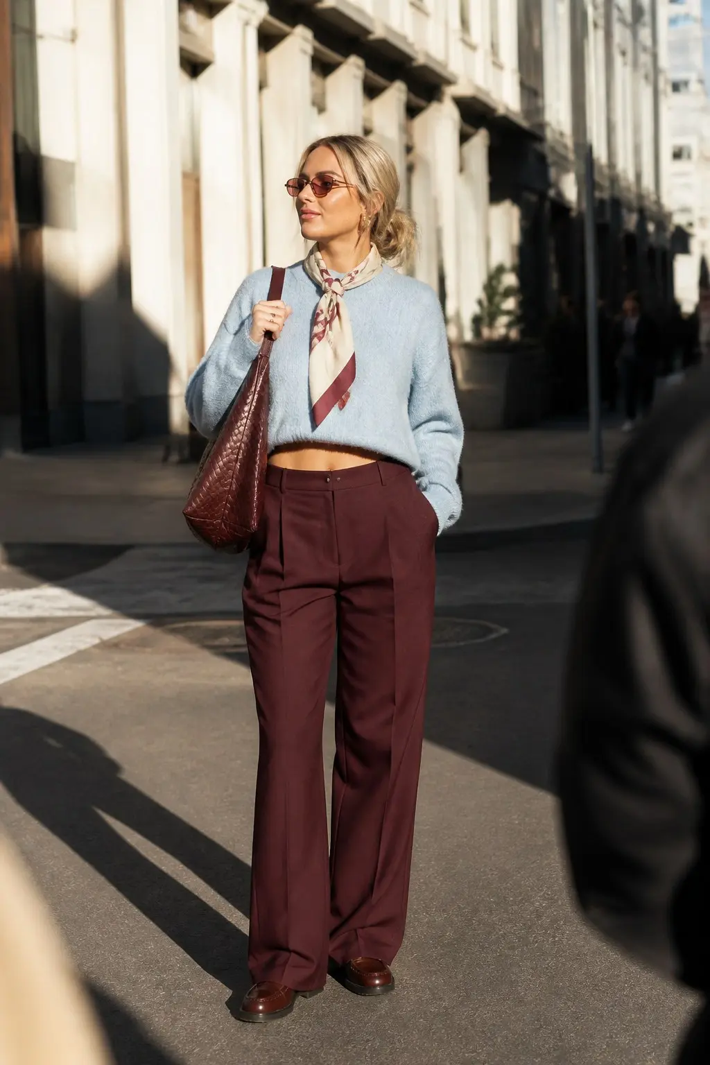 cropped sky blue fluffy knit sweater burgundy high waist wide leg pleated trousers burgundy leather loafers cream burgundy stripe silk neck scarf burgundy woven large tote bag gold hoop earrings outfit 19