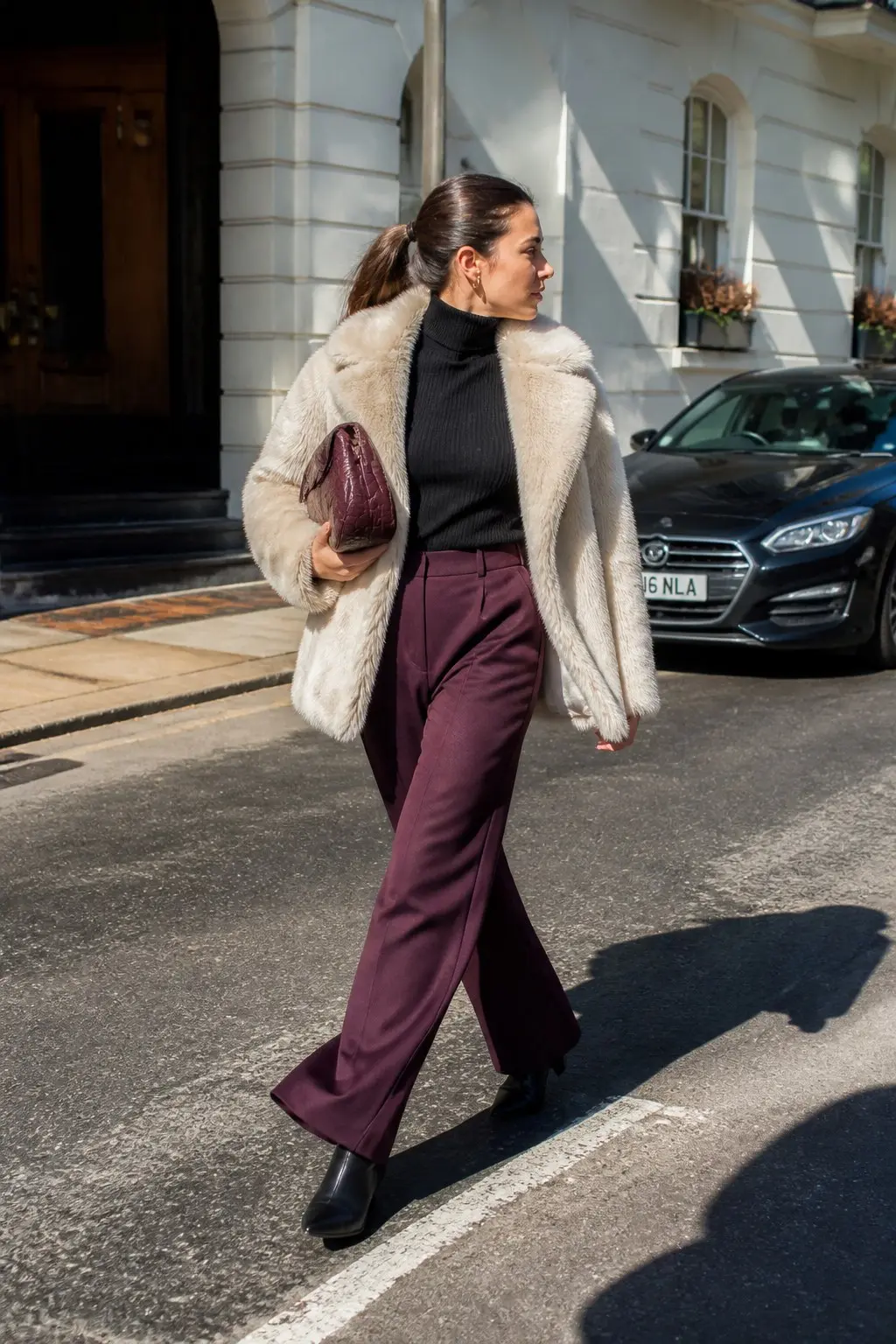 plum wide-leg trousers with black ribbed turtleneck cream faux-fur coat black leather ankle boots and plum croc-embossed clutch outfit 8