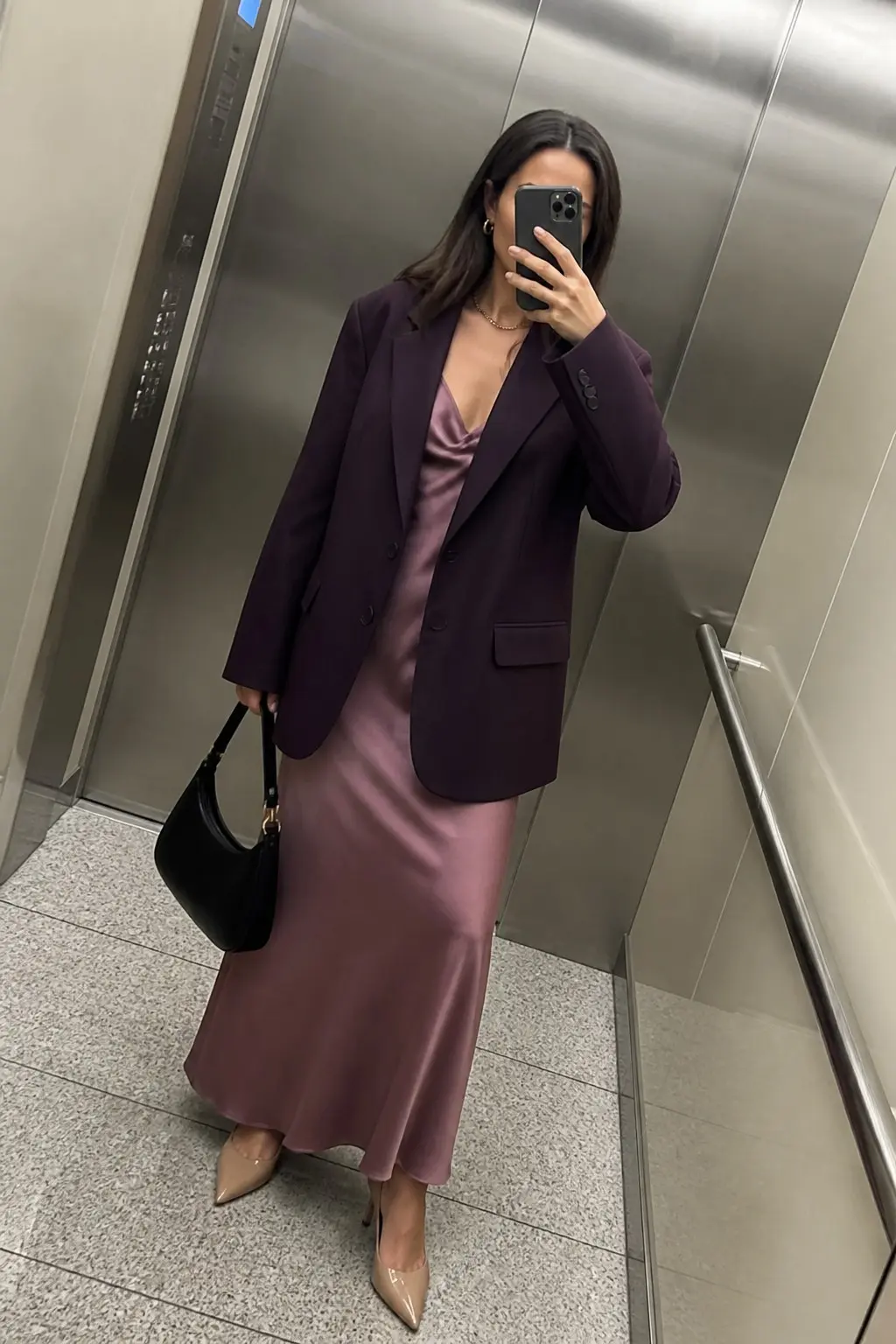 dark purple blazer over mauve pink satin slip dress nude pointed pumps thin gold chain necklace black shoulder bag outfit 9