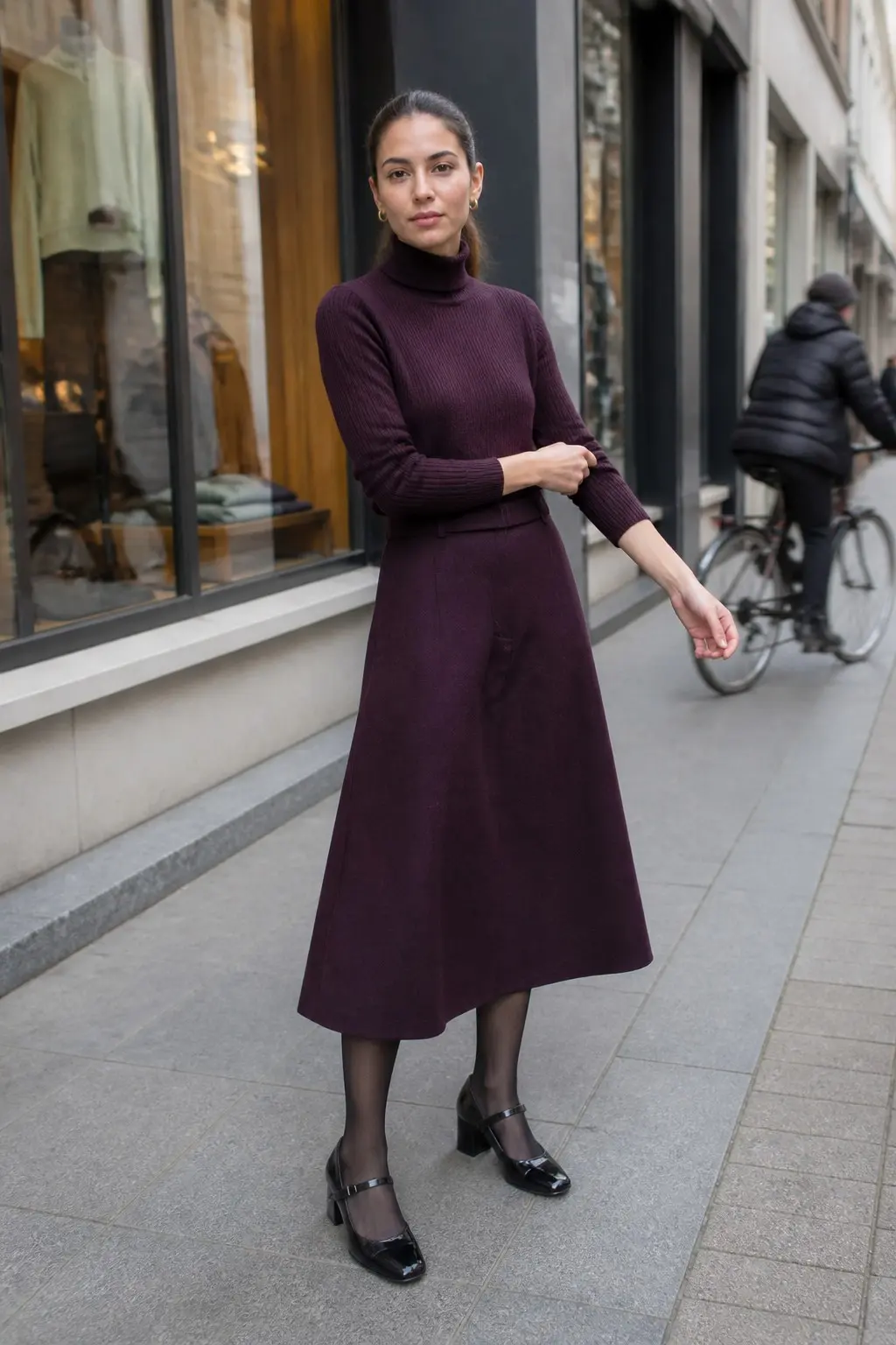plum ribbed turtleneck sweater tucked into plum A-line wool midi skirt black sheer tights black patent mary jane block heels gold hoop earrings outfit 13