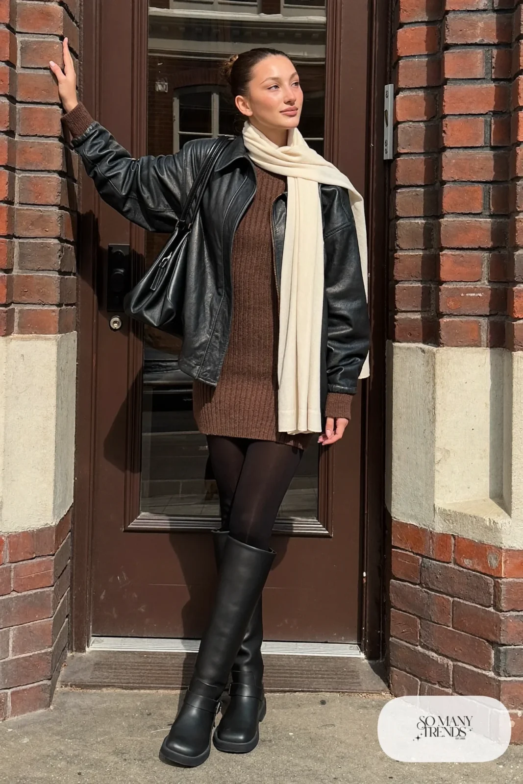 chocolate brown knit sweater dress black leather jacket opaque black tights tall black boots cream scarf outfit 12