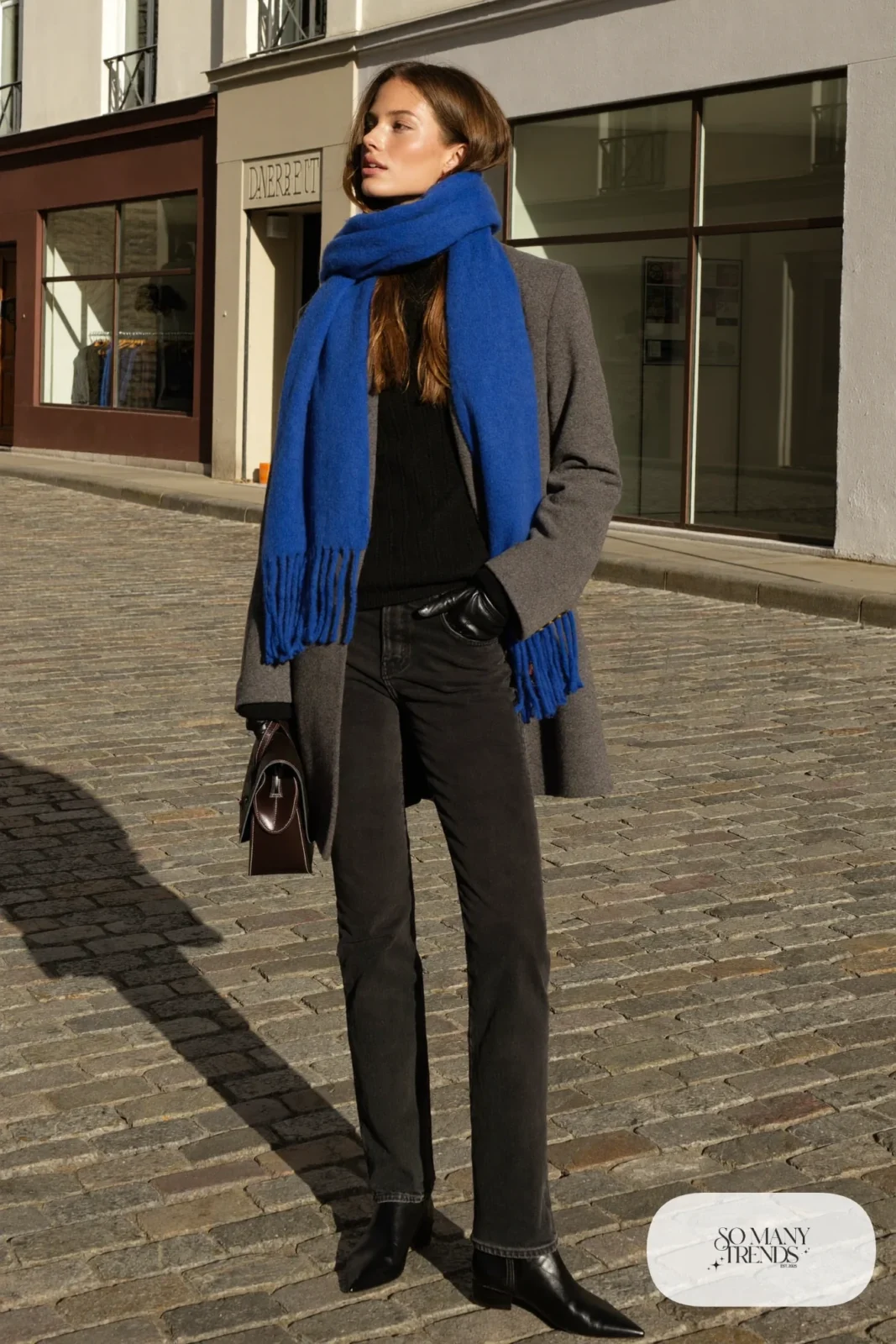 grey wool coat black knit sweater cobalt blue scarf straight black jeans black ankle boots leather gloves outfit 16