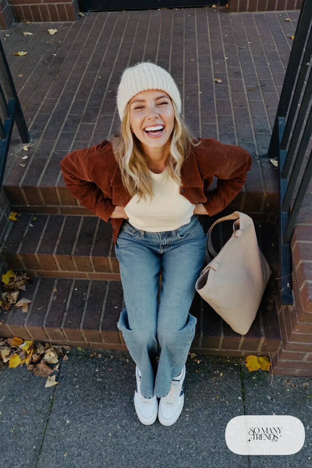 rust corduroy shirt jacket cream tee straight light jeans white sneakers canvas tote knit hat outfit 17