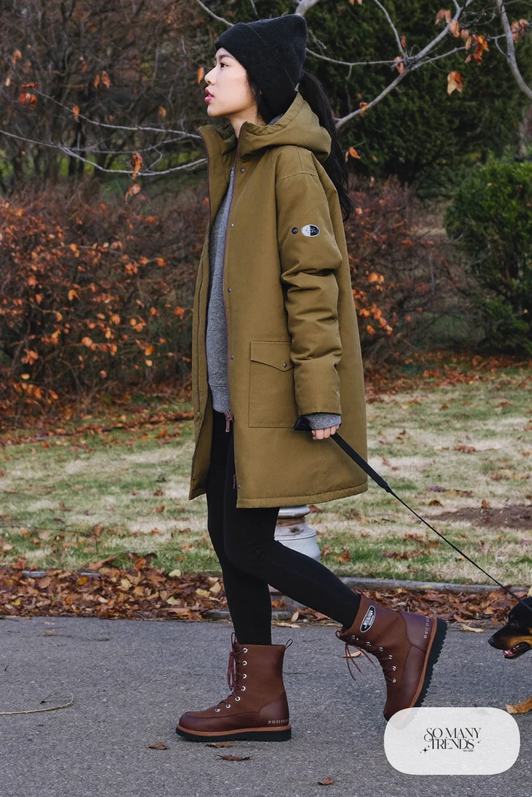 olive parka grey sweatshirt black leggings waterproof boots beanie outfit 19