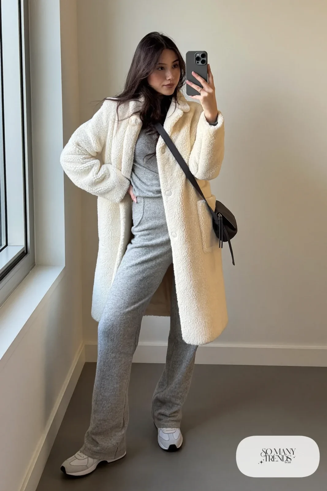 cream teddy coat grey knit top and trousers set white sneakers small bag outfit 25